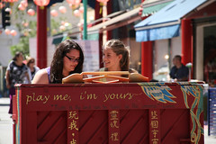 Young Ladies Enjoying Public Piano in Chinatown