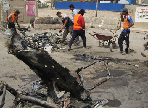 Wreckage from Baghdad explosions that took place on April 19, 2012. Despite the withdrawal of US combat troops the violence continues inside the country. by Pan-African News Wire File Photos
