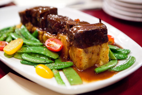 Chile braised short ribs with sweet corn pudding