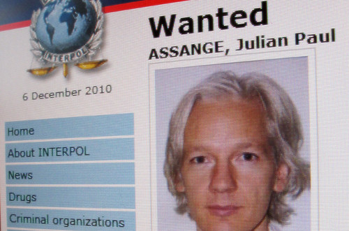 An INTERPOL wanted poster for Julian Assange who was arrested by the British police on December 7, 2010. The WikiLeaks website has exposed U.S. war crimes and other political intrigue carried out by the world's leading imperialist state. by Pan-African News Wire File Photos
