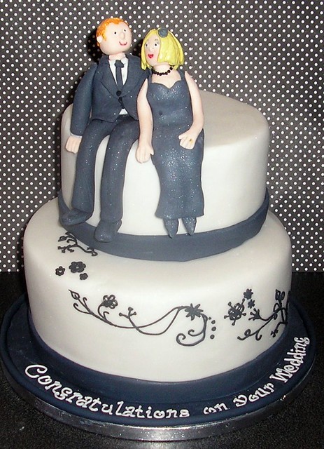 She wanted a wedding cake in black and white any dessign but with the bride