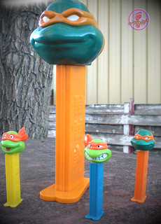 Brand New LLC:: "Teenage Mutant Ninja Turtles" - GIANT PEZ Candy Roll Dispenser, 'MICHELANGELO'  { 2006 reissue } xi // ..with standard 'Michelangelo' '05 PEZ dispenser, 'Michelangelo' '94 Angry & Smiling PEZ Dispensers (( 2010 ))   