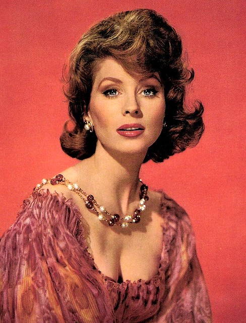 International Model and Actress Suzy Parker is wearing a Creation of Chanel