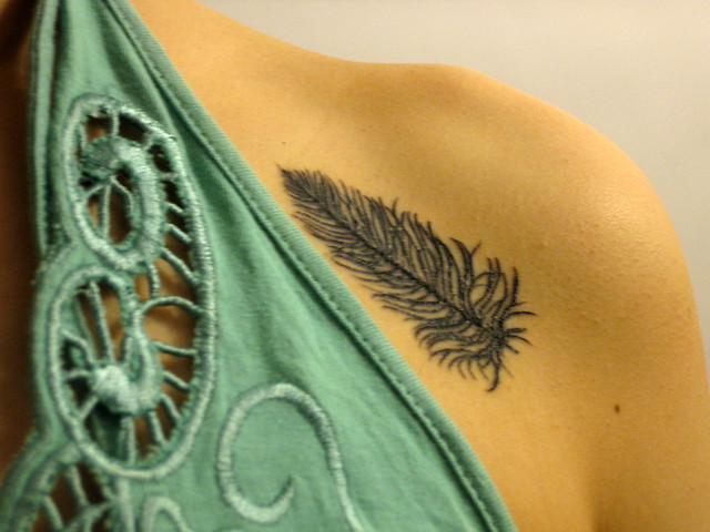 feather tattoo Closeup of tattoo