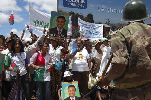 Supporters of ousted Madagascar President Ravalomanana being forced off the road by riot police when the exiled leader was denied admission into his own country. Efforts to work out a political compromise in the Indian Ocean African state has failed. by Pan-African News Wire File Photos