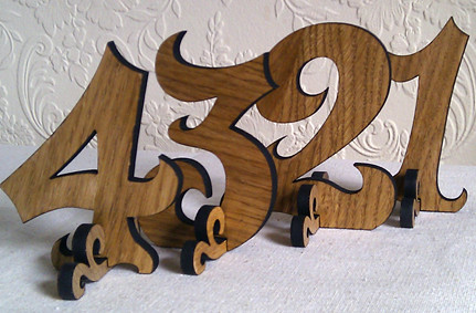 wooden wedding table numbers These wooden table numbers from Hanclock 