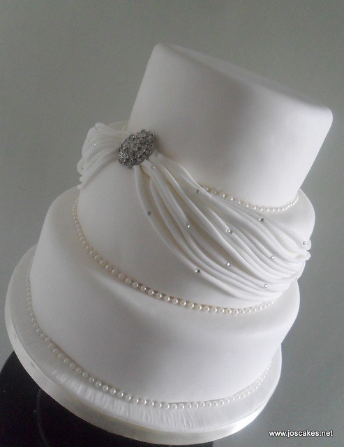 Three tier wedding cake inspired by a Maggie Sottero wedding dress