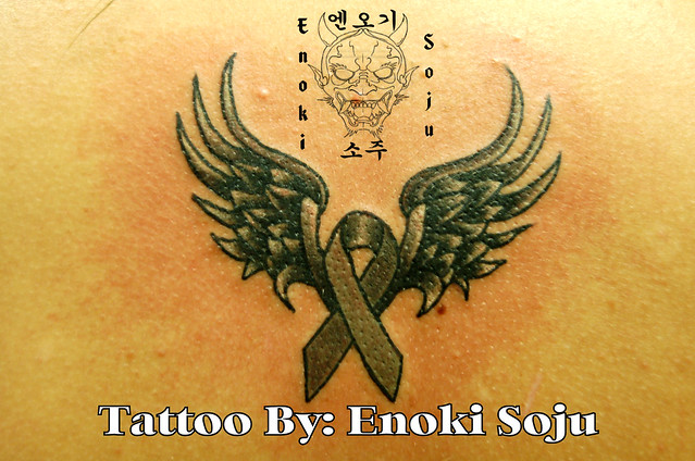 Cancer Ribbon Wing Tattoo