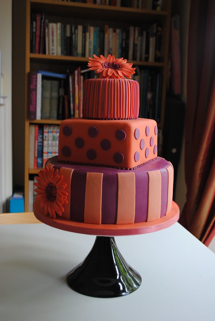 Orange and purple wedding cake