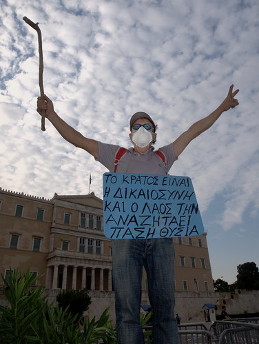 "The state means justice and the people seek it at all costs'- Protesters outside Greek parliament.