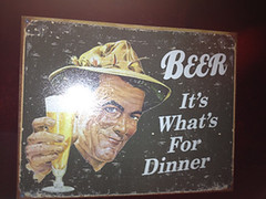 Bathroom sign, Men's Room says "Beer, it's what's for dinner!"