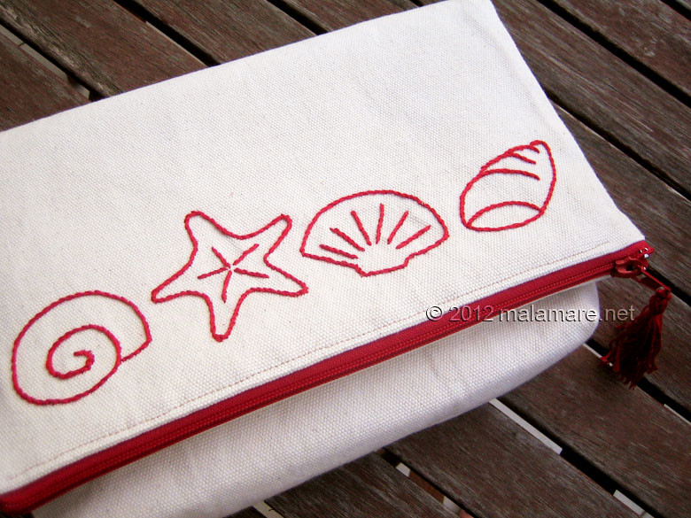 foldover cotton clutch with red hand embroidery fabric