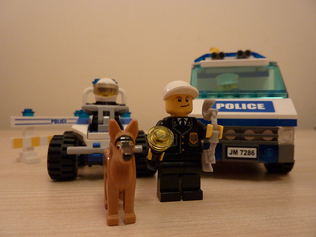 The Lego Traffice Police Officer pictured alongside the Police Dog Handler