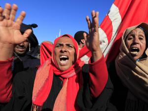 Tunisian women on the frontlines demanding a fundamental change from the neo-colonial RCD regime in their North African country. People attacked a police station in the north of the country on Feb. 6, 2011. by Pan-African News Wire File Photos