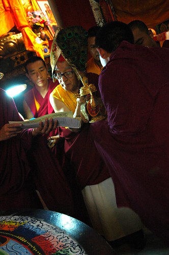 Dagchen Rinpoche leading Sakya Lamdre, masters of ceremony assisting him in the blessing of the gold and silver vase of nectar, Shri Hevajra Empowerment into practice end of the initation, Tharlam Monastery of Tibetan Buddhism, Boudha, Kathmandu, Nepal by Wonderlane
