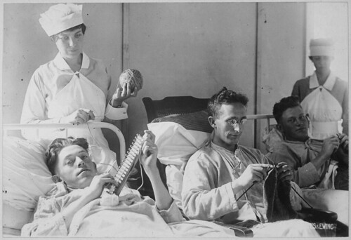 Bed-ridden wounded, knitting. Walter Reed Hospital, Washington, D.C. Harris & Ewing., ca. 1918 - ca. 1919 by The U.S. National Archives