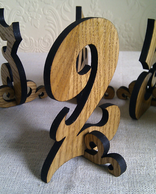 These wooden table numbers from Hanclock Designs would look great for your