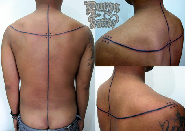 serepak abag Mentawai titi male back tattoo motive 2 male back tattoos