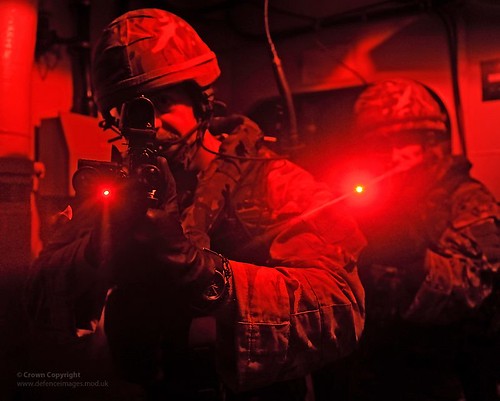 Royal Marines Conducting Boarding Training With SA80 Rifles and Laser Light Modules