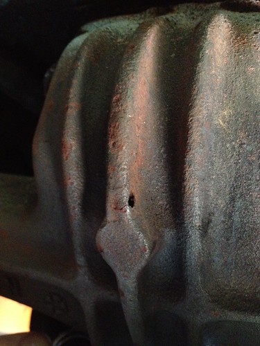 Hole in exhaust manifold