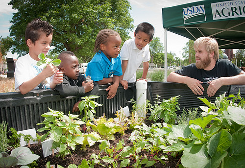 Farmers markets are a perfect venue for teaching children about the food they eat.  Initiatives across the country, like this People’s Garden event at the USDA Farmers Market, encourage the development of healthy eating habits at an early age.