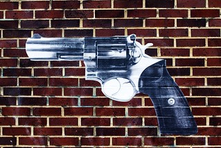 handgun on bricks