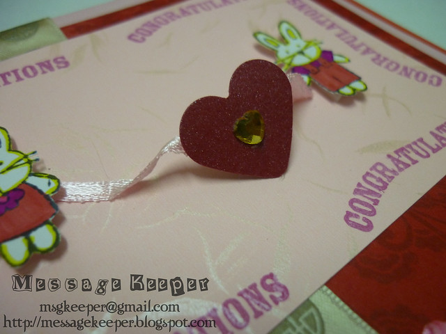 Rabbit Wedding Wishes Card Closeup The red punched heart with yellow gem 