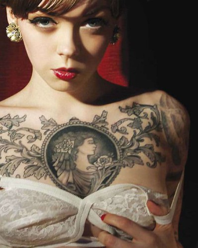 Art tattoo on a woman's body in places that give meaning to the owner of a