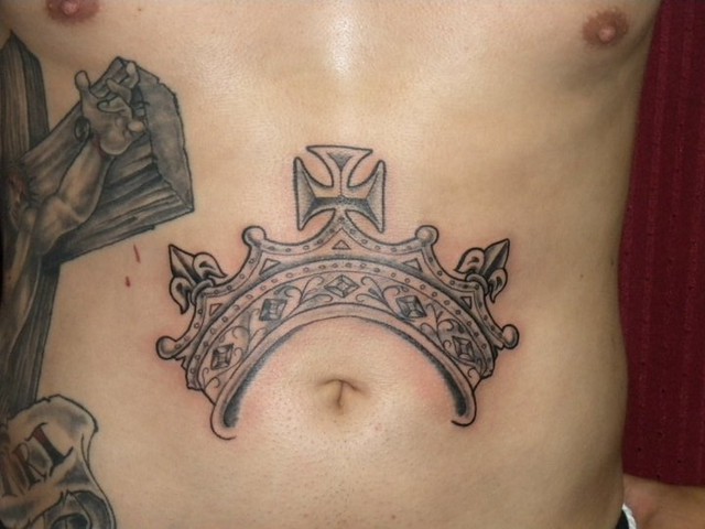 The crown tattoo is usually designed with other symbols but a few designs