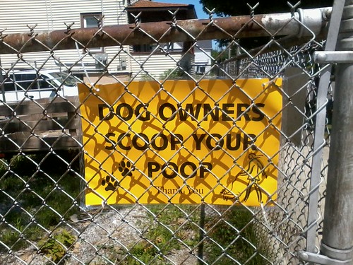 Scoop your poop, you stupid dog owners!!