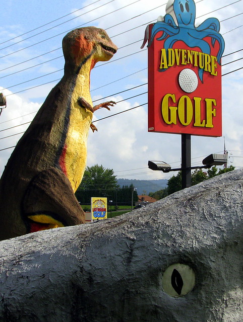 Adventure Golf: Sign with T-Rex and Jaws