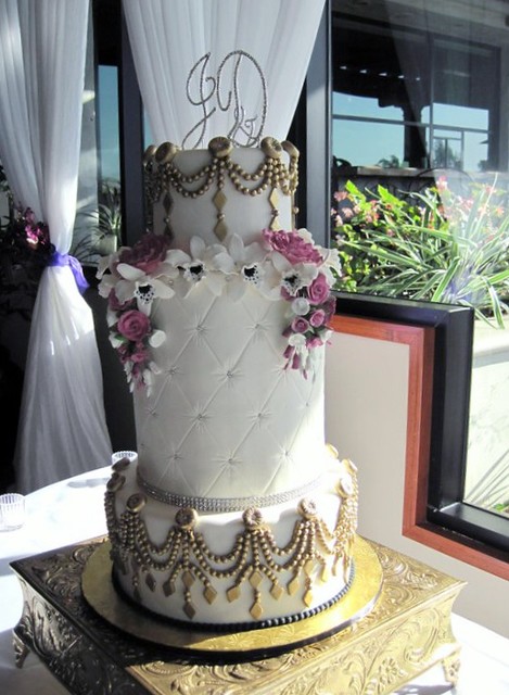 Three tier all fondant wedding cake Gumpaste flowers and fondant pearl 