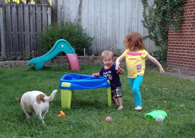 HOURS later and the water table is still entertaining all 3of them.