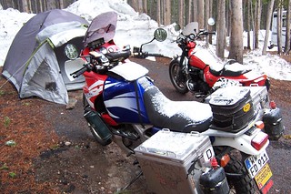 Snow on our motorcycles in Yellowstone