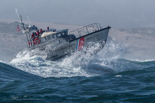 Coast Guard 47 foot Motor Lifeboat practicing in the big surf