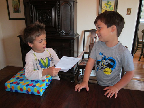Ezra reads Finn his card