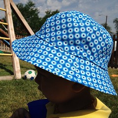 The blue side of the bucket hat.