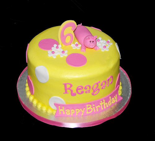 yellow and pink girly pig 6th birthday cake