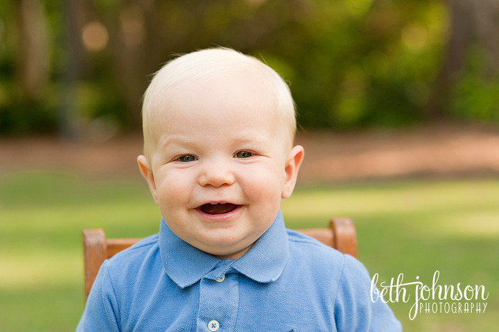 little boy first birthday big smile blue shirt tallahassee