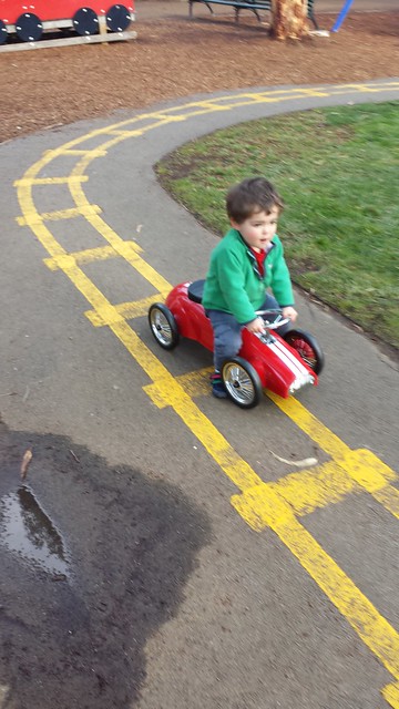 Zooming by on his 'bike'