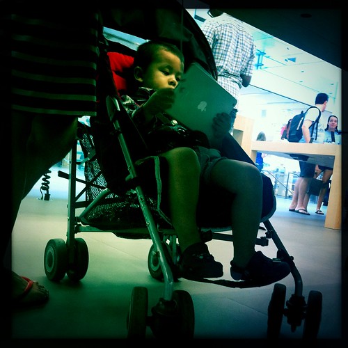 My nephew at the Apple Store, Soho
