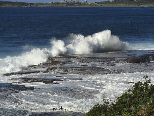 Waves crashing onto rocks at Barrack Point