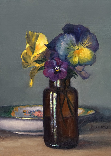 Pansies with saucer