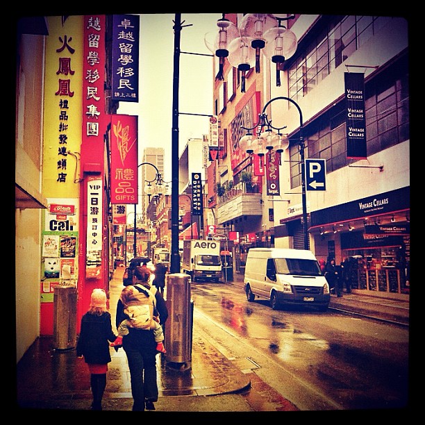 Rainy day baby-wearing in downtown Chinatown. #babywearing #melbourne