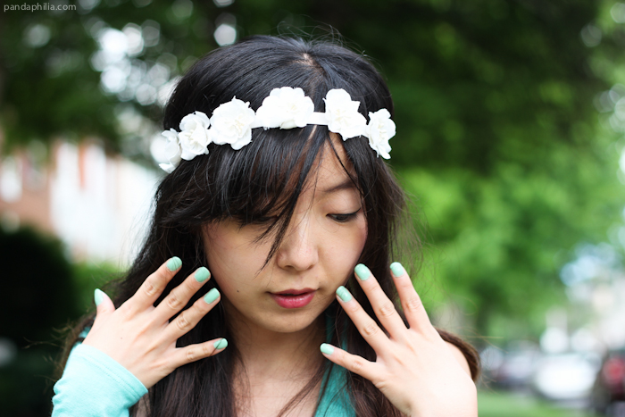 flower crown and mint nail polish