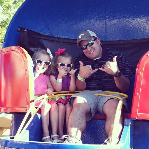 These three love the Tilt a Whirl. None for me, thanks!