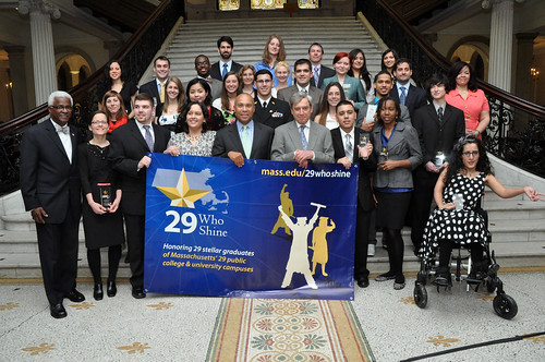 Commissioner Freeland and the "29 Who Shine" students gather in front of the Massachusetts State House