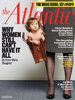 Atlantic cover shows a woman holding a white baby in a briefcase