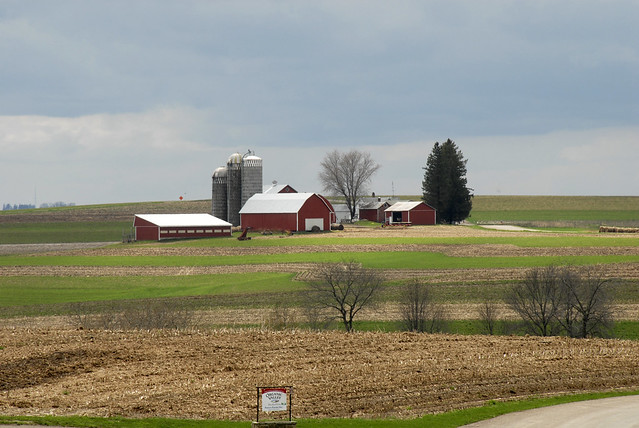 A family farm sits on small knoll in La Crosse, Wisconsin.