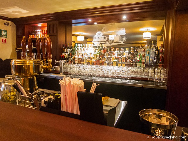 A well-stocked bar, with five beers on tap